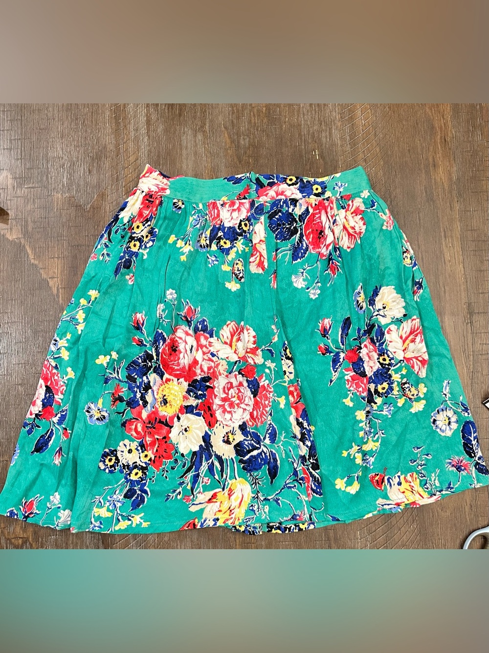 Anthropologie Maeve floral skirt with red, blue, and yellow flowers